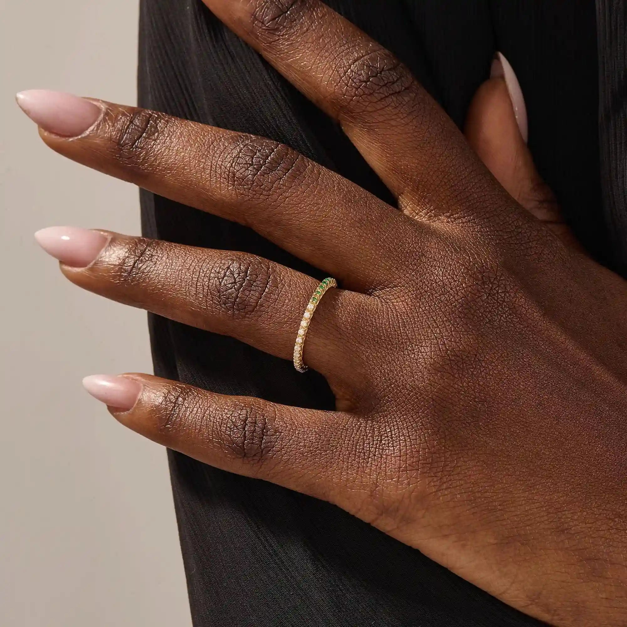 half of the ring is lab grown emerald other half clear colorless moissanite eternity stacking wedding ring in gold for women