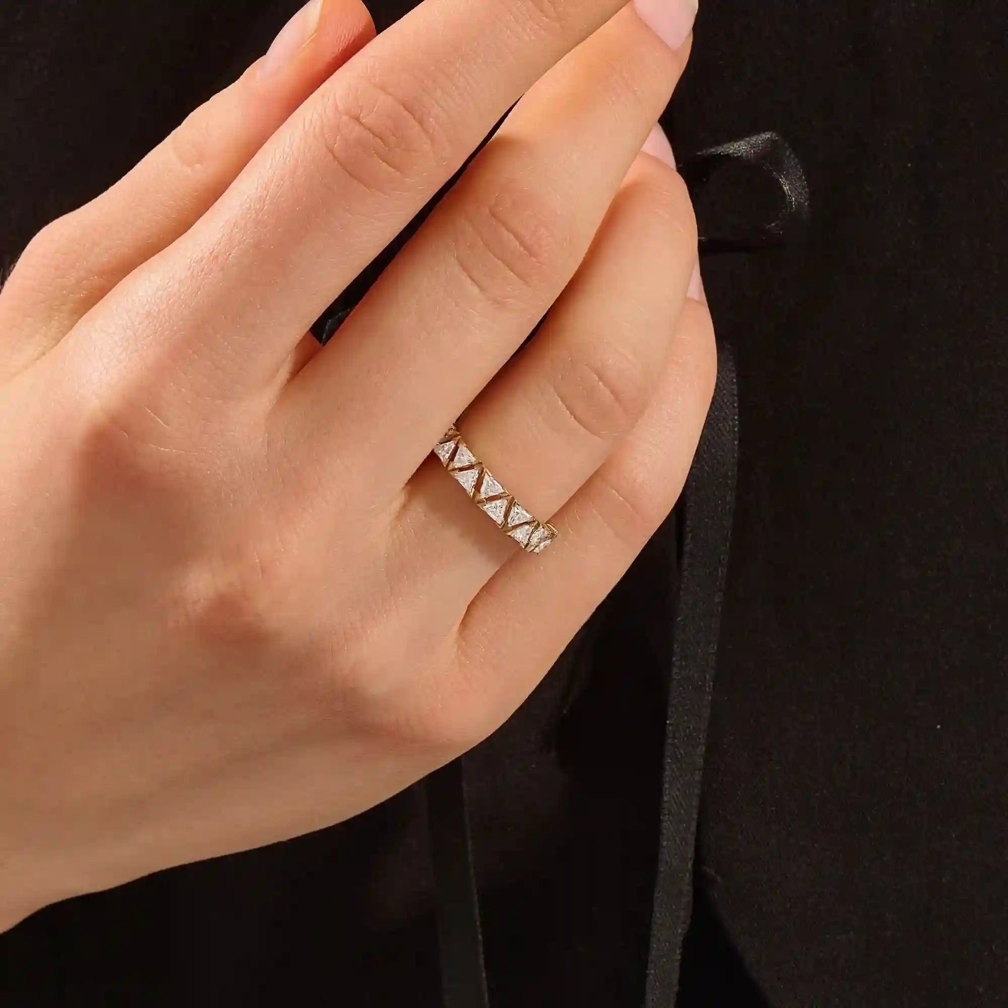 Gold triangle ring with moissanite accents