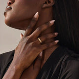 intricately designed unique half-eternity beaded plain band in solid gold for ladies