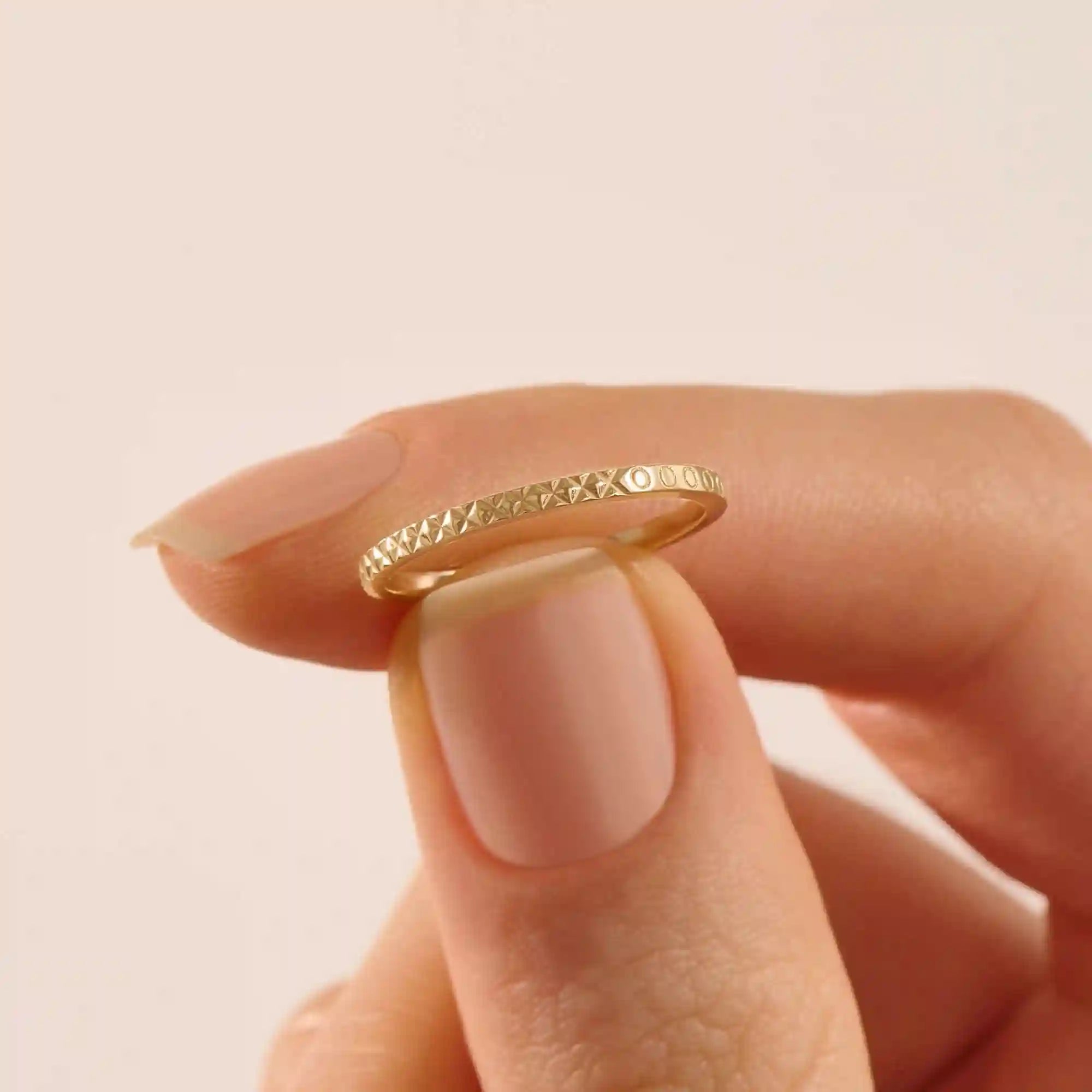 elegant slim stackable wedding ring with unique x pyramid and circle patterns on both sides in 14k solid yellow gold for both men and women