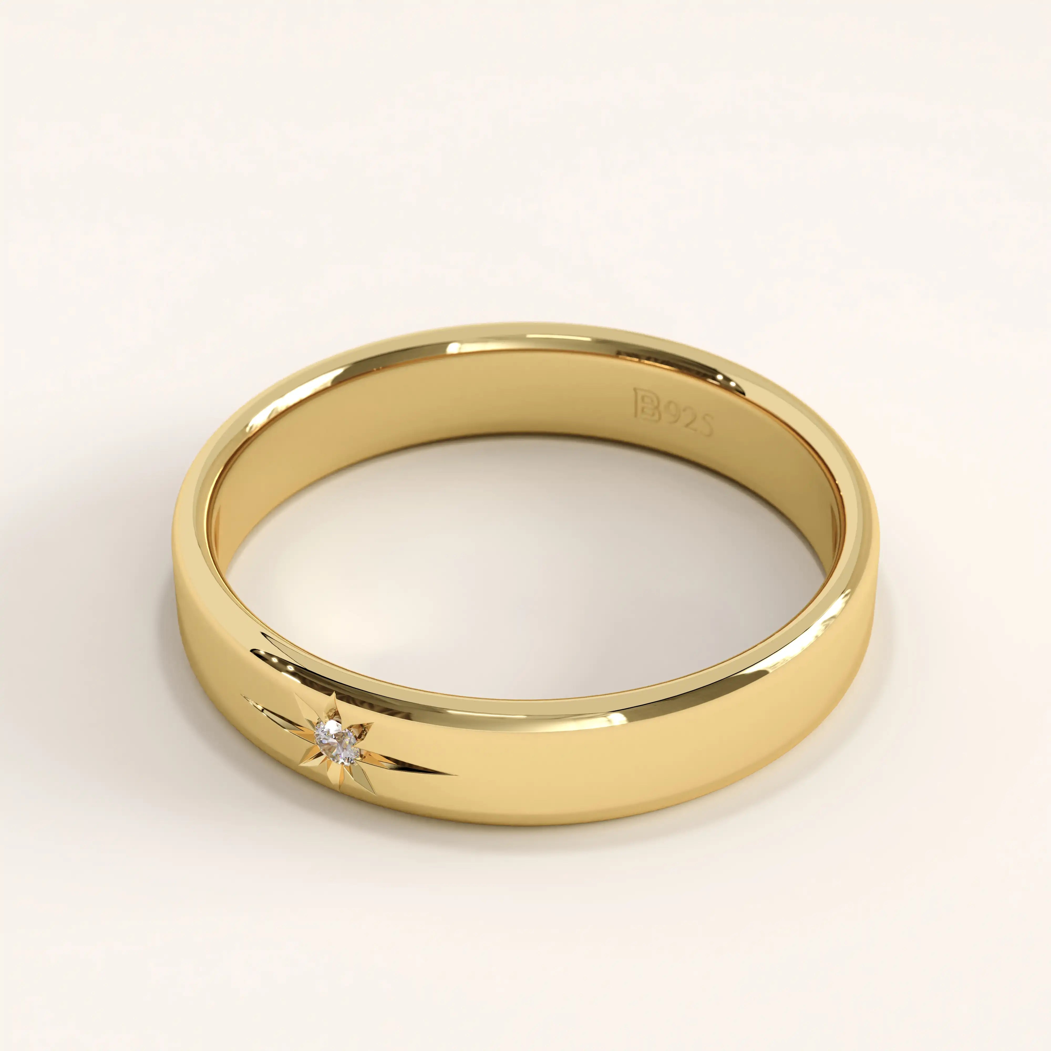 Side angle of 14k gold vermeil Northstar ring showing the cubic zirconia stone and polished celestial engraving on a smooth band.
