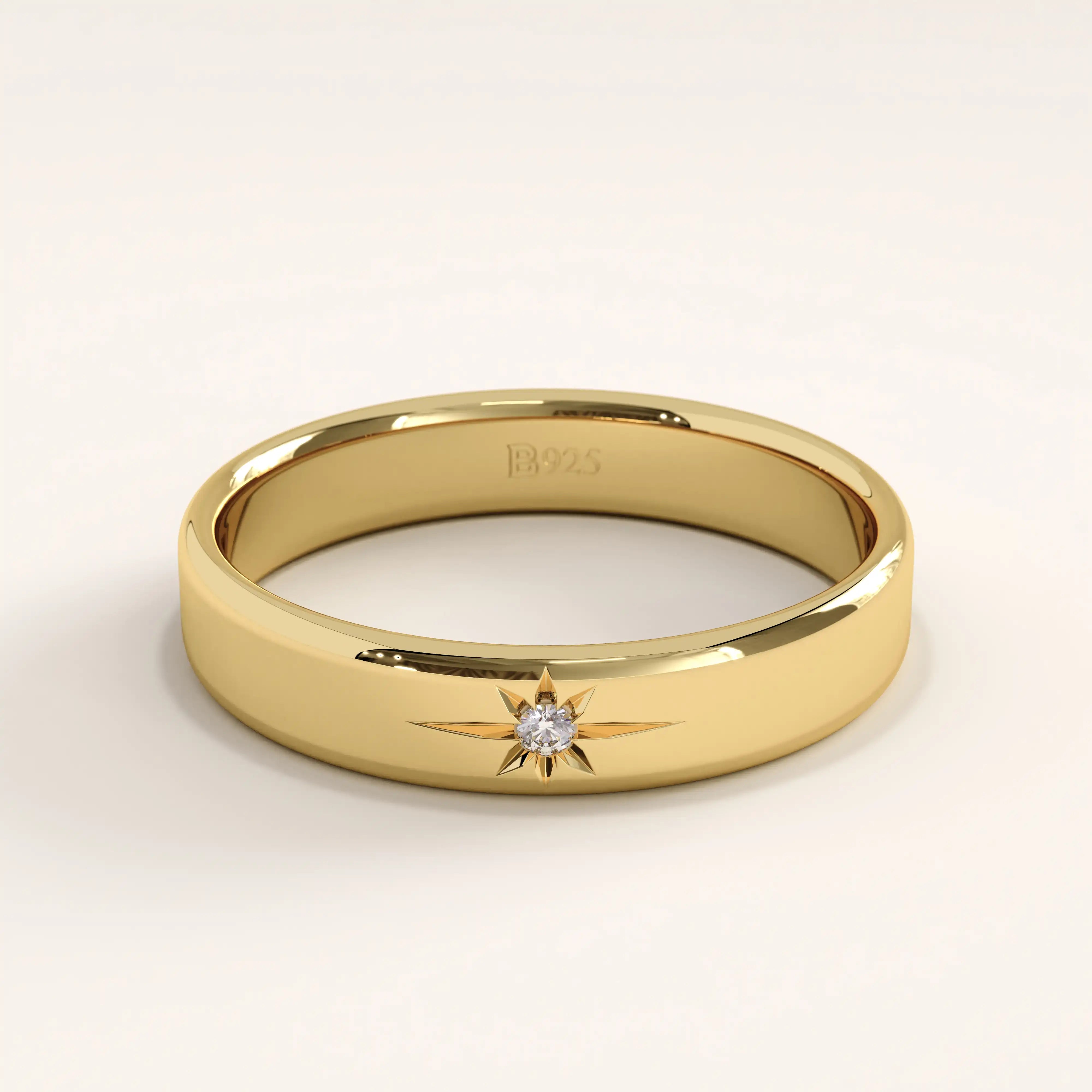 14k gold vermeil Northstar ring featuring a cubic zirconia center stone set in a celestial star engraving, dainty gold band for women.
