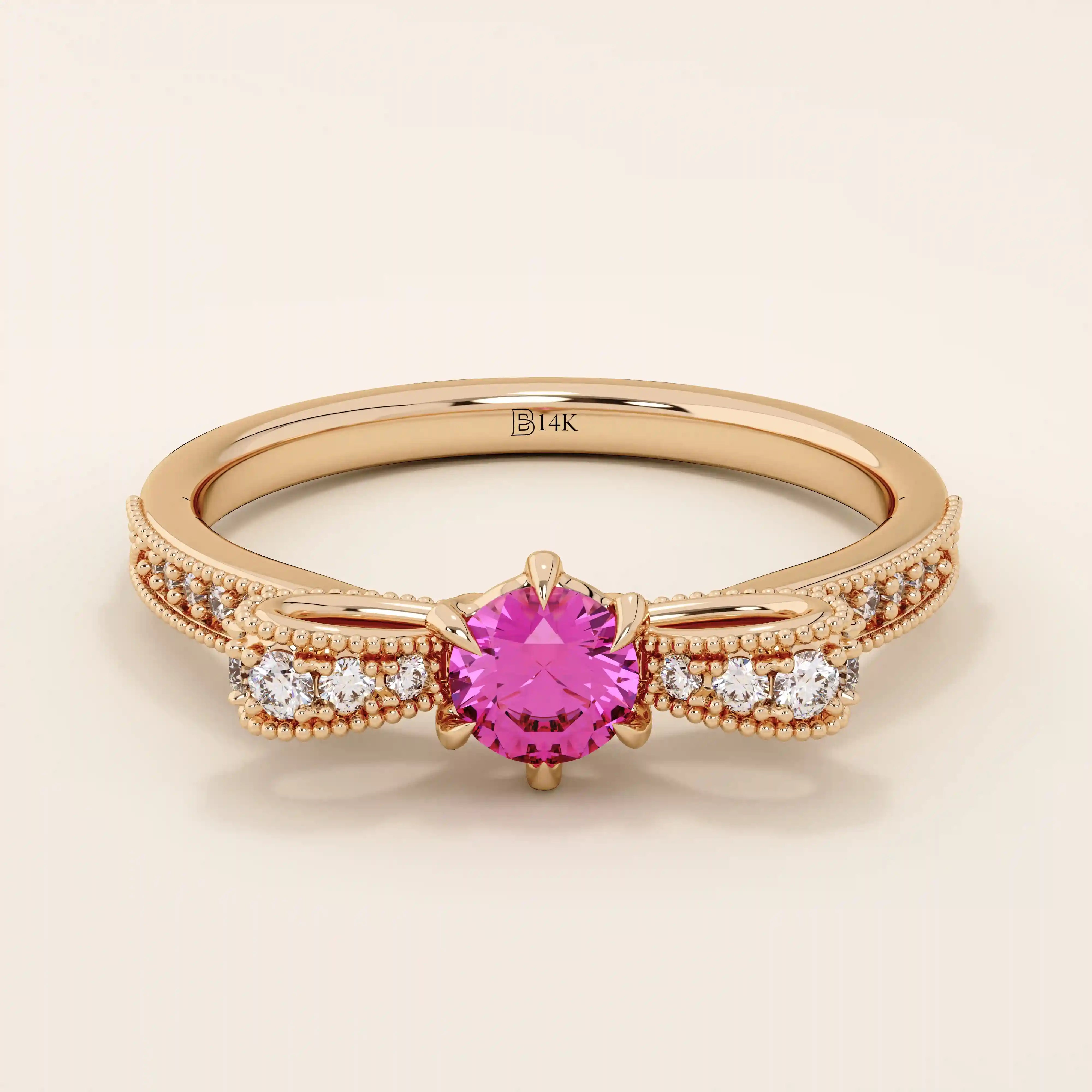 14k gold ribbon-shaped ring with a vibrant lab-grown ruby at the center. Elegant and romantic design with gemstone sparkle.