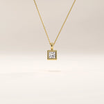 14k gold vermeil princess solitaire necklace featuring a square-cut cubic zirconia set in a sleek bezel frame for a modern, timeless look.
