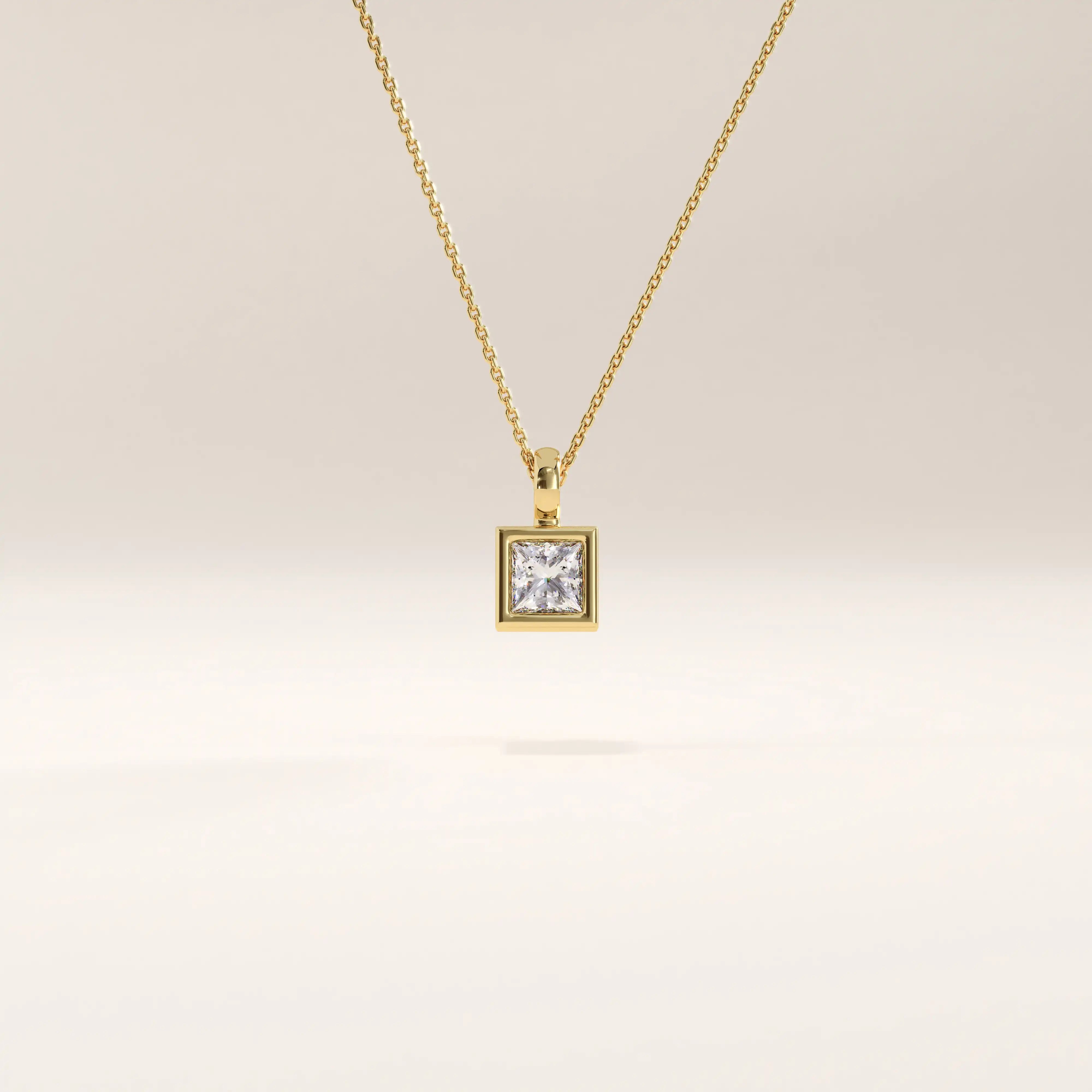 14k gold vermeil princess solitaire necklace featuring a square-cut cubic zirconia set in a sleek bezel frame for a modern, timeless look.
