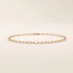 14k rose gold bracelet with slim elongated links in a minimalist chain style.

