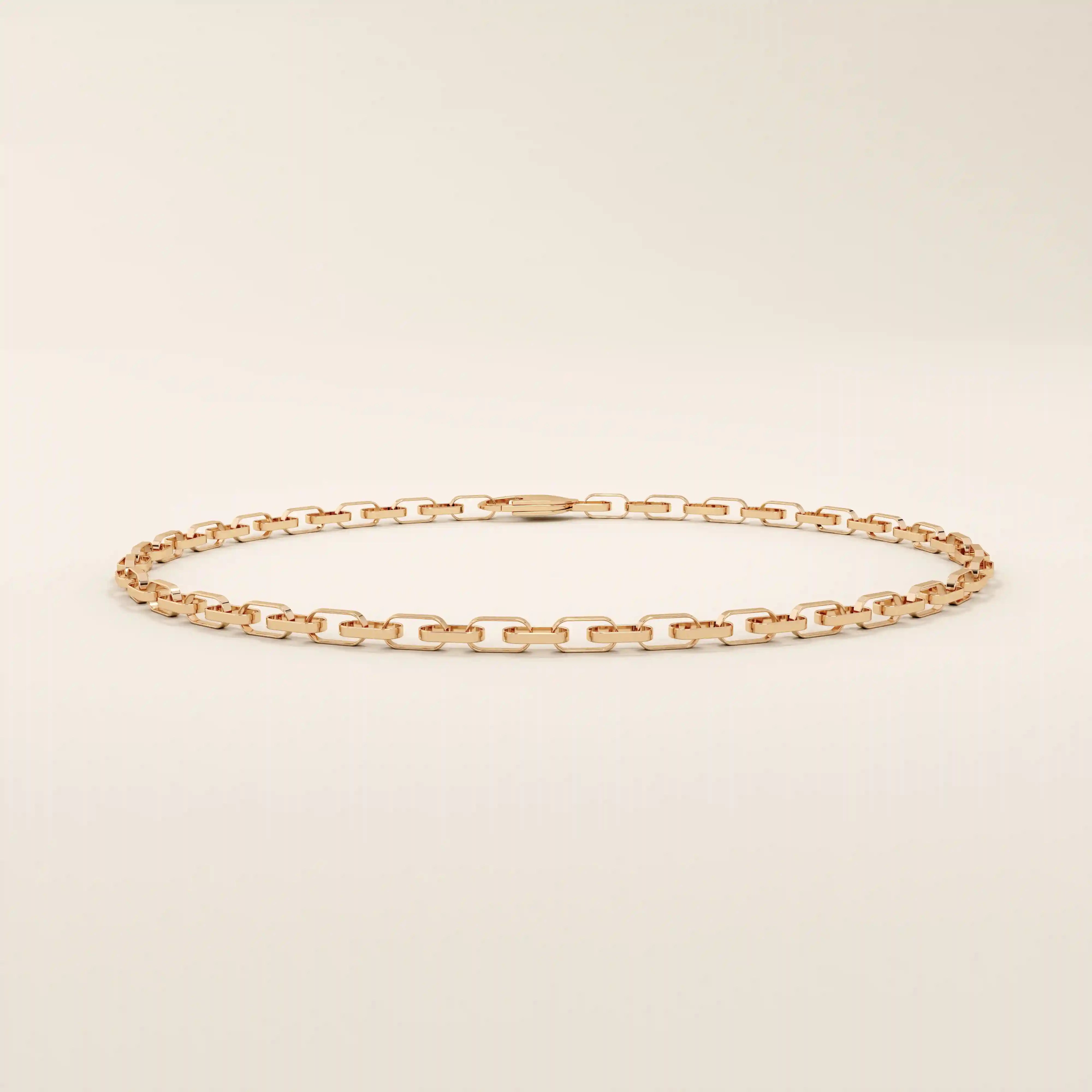 14k rose gold rolo chain bracelet with softly rounded rectangular links in a warm polished tone.
