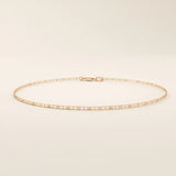 14k rose gold scroll chain bracelet designed with rectangular scrollwork links in a repeating elegant pattern.
