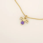 14k solid gold Aquarius zodiac symbol pendant necklace with a deep purple amethyst. Minimalist astrology birthstone jewelry.
