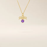 14k solid gold Aquarius zodiac symbol pendant necklace with a deep purple amethyst. Minimalist astrology birthstone jewelry.