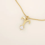 14k solid gold Aries zodiac symbol pendant necklace with a sparkling clear moissanite, minimalist astrology jewelry.