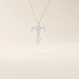 14k solid gold Aries zodiac symbol pendant necklace with a sparkling clear moissanite, minimalist astrology jewelry.