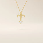 14k solid gold Aries zodiac symbol pendant necklace with a sparkling clear moissanite, minimalist astrology jewelry.