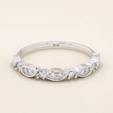 14k solid gold Art Deco-inspired stacking wedding ring with pave-set moissanites. Geometric and elegant design perfect for layering.