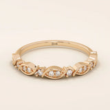 14k solid gold Art Deco-inspired stacking wedding ring with pave-set moissanites. Geometric and elegant design perfect for layering.