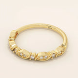 14k solid gold Art Deco-inspired stacking wedding ring with pave-set moissanites. Geometric and elegant design perfect for layering.