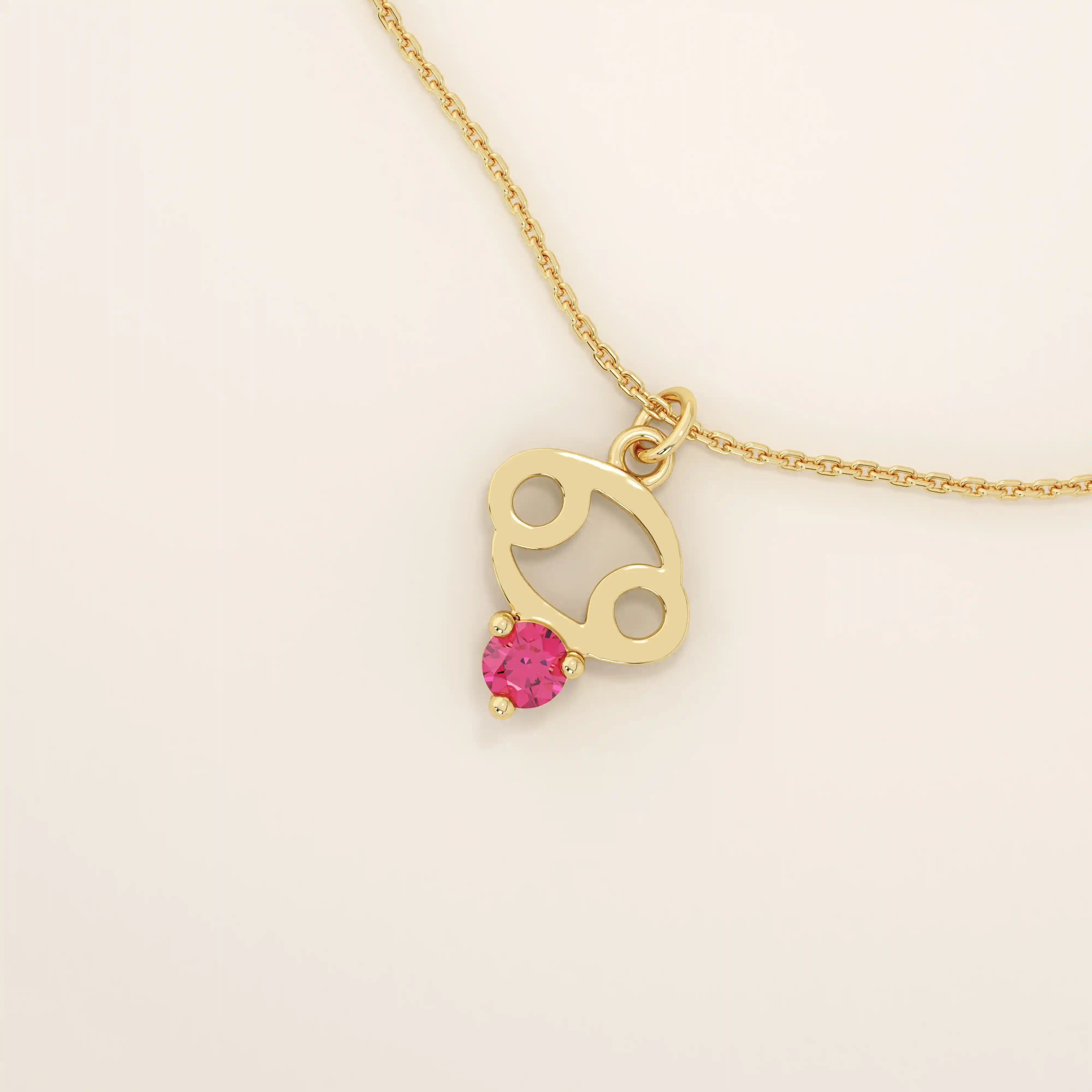 14k solid gold Cancer zodiac pendant necklace featuring a vibrant lab-grown ruby birthstone. A personalized and meaningful zodiac jewelry piece.