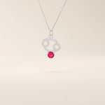 14k solid gold Cancer zodiac pendant necklace featuring a vibrant lab-grown ruby birthstone. A personalized and meaningful zodiac jewelry piece.