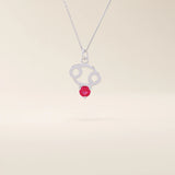 14k solid gold Cancer zodiac pendant necklace featuring a vibrant lab-grown ruby birthstone. A personalized and meaningful zodiac jewelry piece.