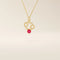 14k solid gold Cancer zodiac pendant necklace featuring a vibrant lab-grown ruby birthstone. A personalized and meaningful zodiac jewelry piece.