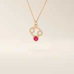 14k solid gold Cancer zodiac pendant necklace featuring a vibrant lab-grown ruby birthstone. A personalized and meaningful zodiac jewelry piece.