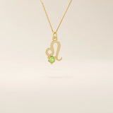 14k solid gold Leo zodiac symbol pendant necklace with a round green peridot, minimalist astrology birthstone jewelry.