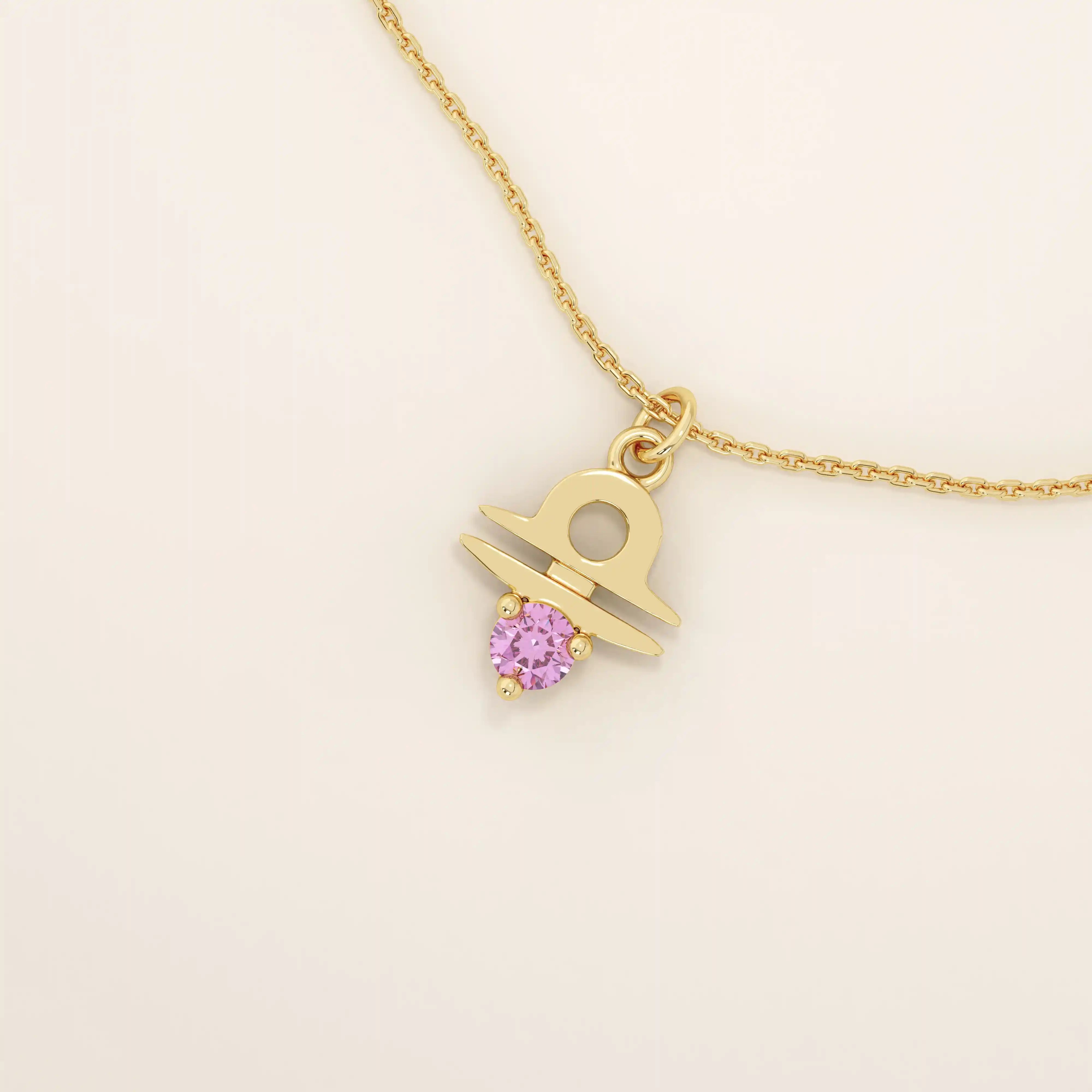 14k solid gold Libra zodiac symbol pendant necklace with a vibrant pink tourmaline. Minimalist astrology birthstone jewelry.