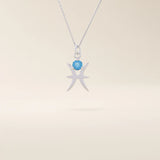 14k solid gold Pisces zodiac symbol pendant necklace with a round aquamarine, minimalist astrology birthstone jewelry.