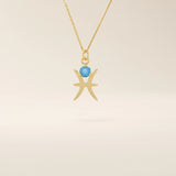 14k solid gold Pisces zodiac symbol pendant necklace with a round aquamarine, minimalist astrology birthstone jewelry.
