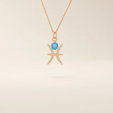 14k solid gold Pisces zodiac symbol pendant necklace with a round aquamarine, minimalist astrology birthstone jewelry.