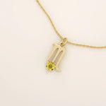 14k solid gold Scorpio zodiac symbol pendant necklace with a warm citrine gemstone. Minimalist astrology birthstone jewelry for women.