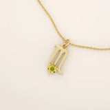 14k solid gold Scorpio zodiac symbol pendant necklace with a warm citrine gemstone. Minimalist astrology birthstone jewelry for women.