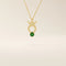 14k solid gold Taurus zodiac pendant necklace with a rich green emerald birthstone. A personalized and elegant zodiac accessory.