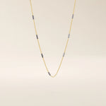 14k solid gold and white gold mixed metal bar chain necklace with sleek, alternating links. A bold and modern two-tone gold chain. Perfect for everyday or statement layering.