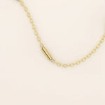 14k solid gold bar chain necklace with sleek horizontal links and a polished finish. A modern and minimal gold chain. Great for layering or wearing alone.