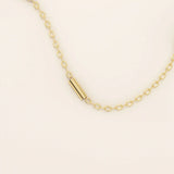 14k solid gold bar chain necklace with sleek horizontal links and a polished finish. A modern and minimal gold chain. Great for layering or wearing alone.