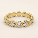 14k solid gold bold dots band ring with pave-set moissanites. Modern statement jewelry for women.