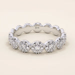 14k solid gold bold dots band ring with pave-set moissanites. Modern statement jewelry for women.