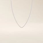 14k solid gold box chain necklace with square-shaped links and a smooth finish. A timeless and durable gold chain. Ideal for daily wear or layering.