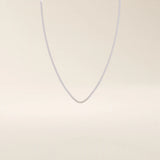 14k solid gold box chain necklace with square-shaped links and a smooth finish. A timeless and durable gold chain. Ideal for daily wear or layering.