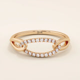 14k solid gold chain ring with bold links and pavé moissanite accents. A statement piece that combines texture and sparkle.