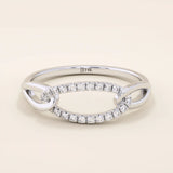 14k solid gold chain ring with bold links and pavé moissanite accents. A statement piece that combines texture and sparkle.