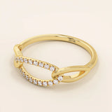 14k solid gold chain ring with bold links and pavé moissanite accents. A statement piece that combines texture and sparkle.