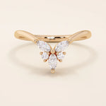 14k solid gold chevron-shaped curve nesting ring adorned with marquise-cut moissanite stones. Modern and minimalist stacking design.