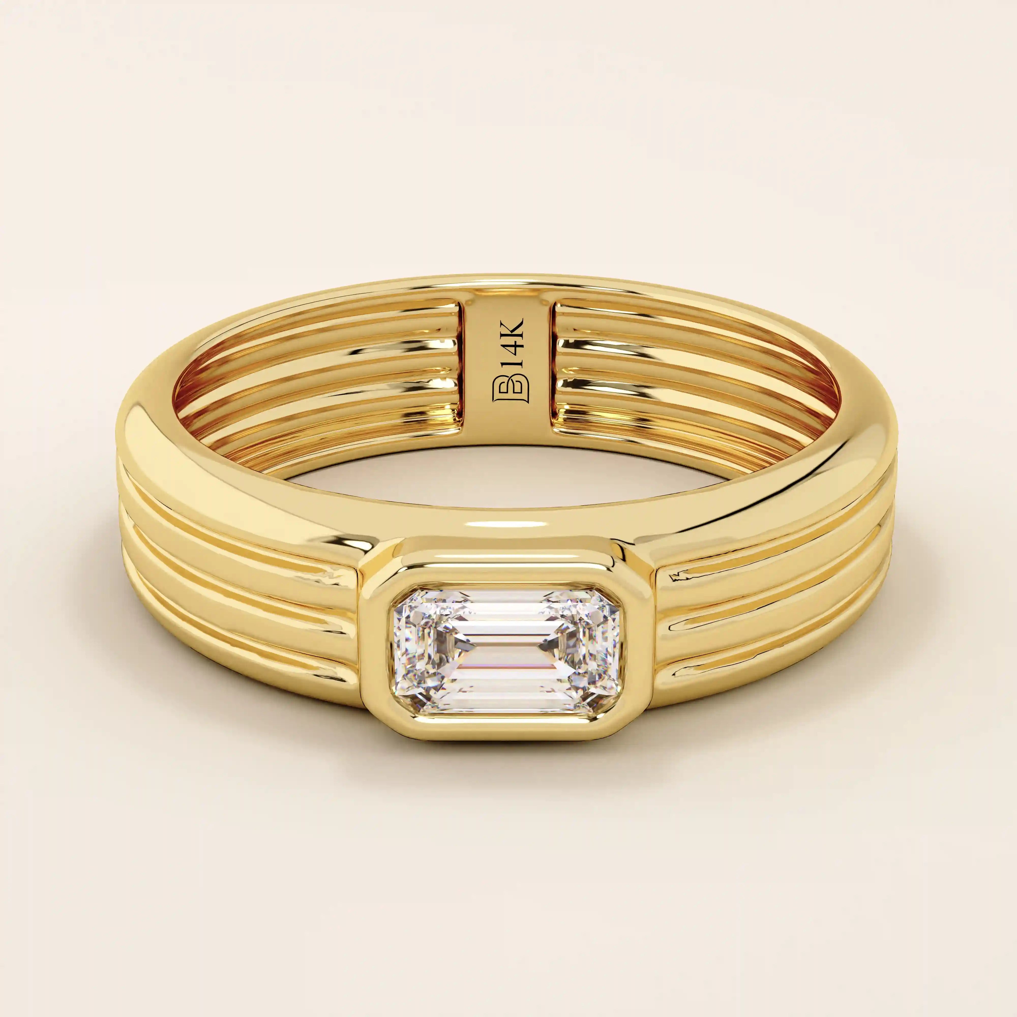 14k solid gold chunky engagement ring with a thick band, featuring bezel-set emerald-cut moissanites lining the band. Bold and modern design for statement bridal jewelry.