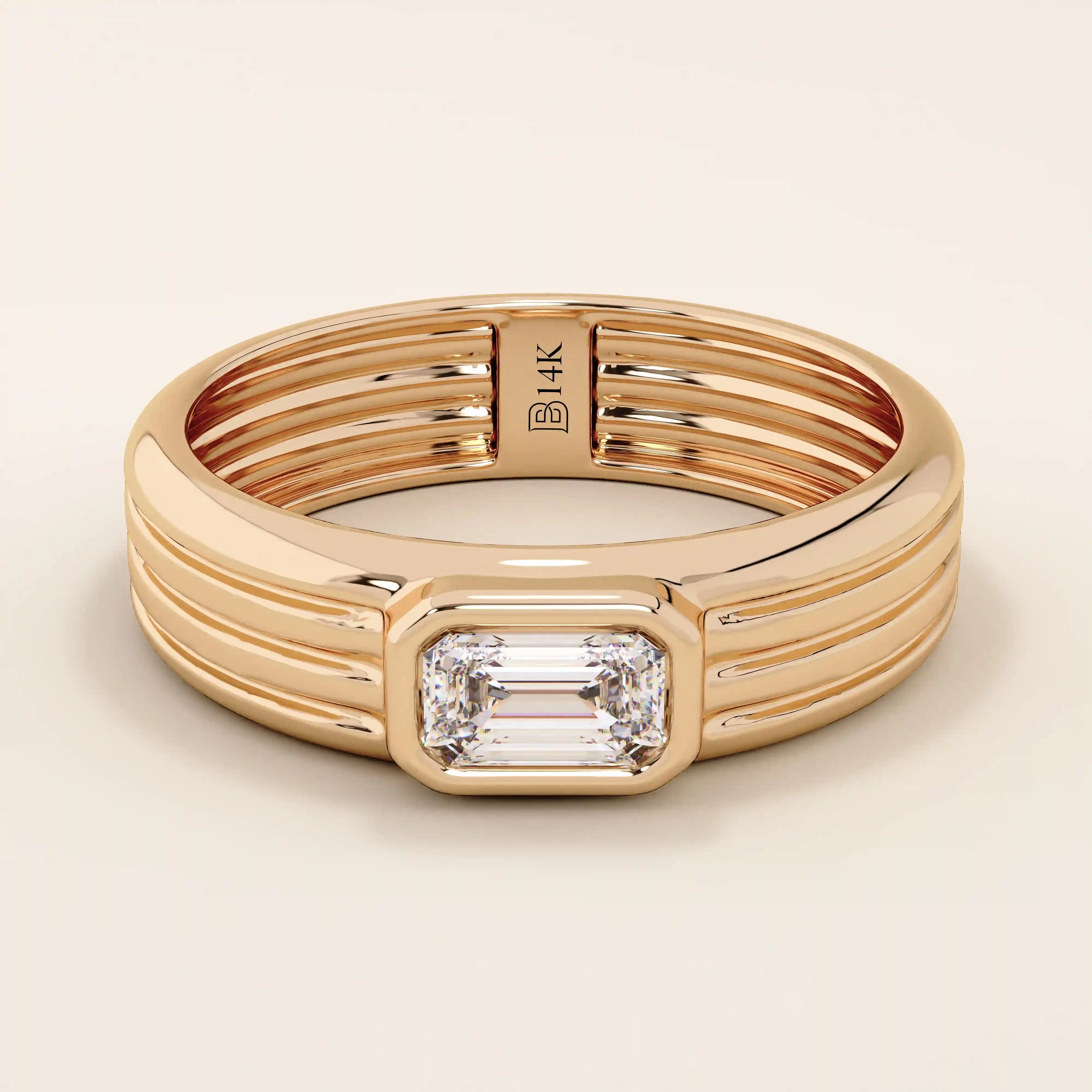 14k solid gold chunky engagement ring with a thick band, featuring bezel-set emerald-cut moissanites lining the band. Bold and modern design for statement bridal jewelry.