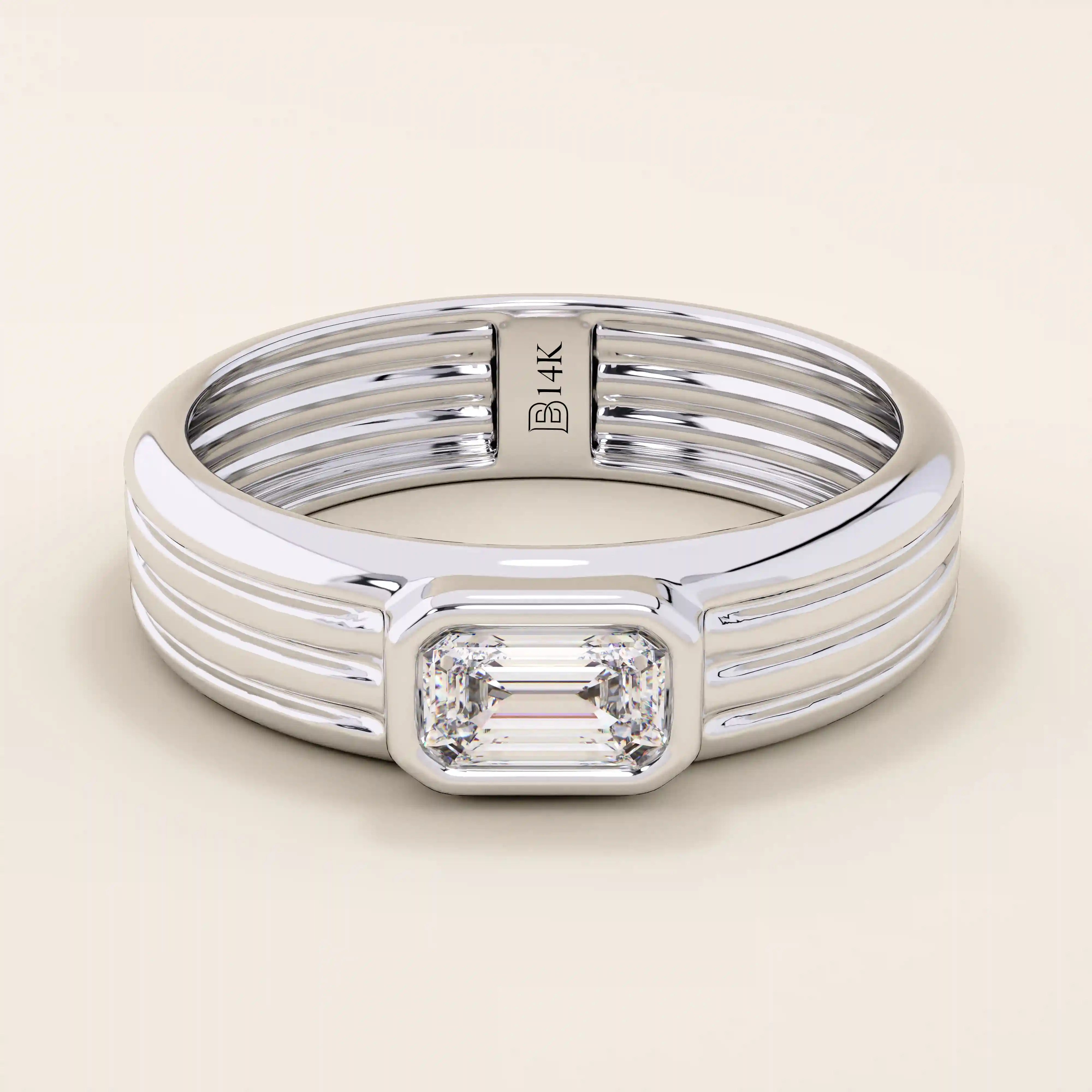 14k solid gold chunky engagement ring with a thick band, featuring bezel-set emerald-cut moissanites lining the band. Bold and modern design for statement bridal jewelry.
