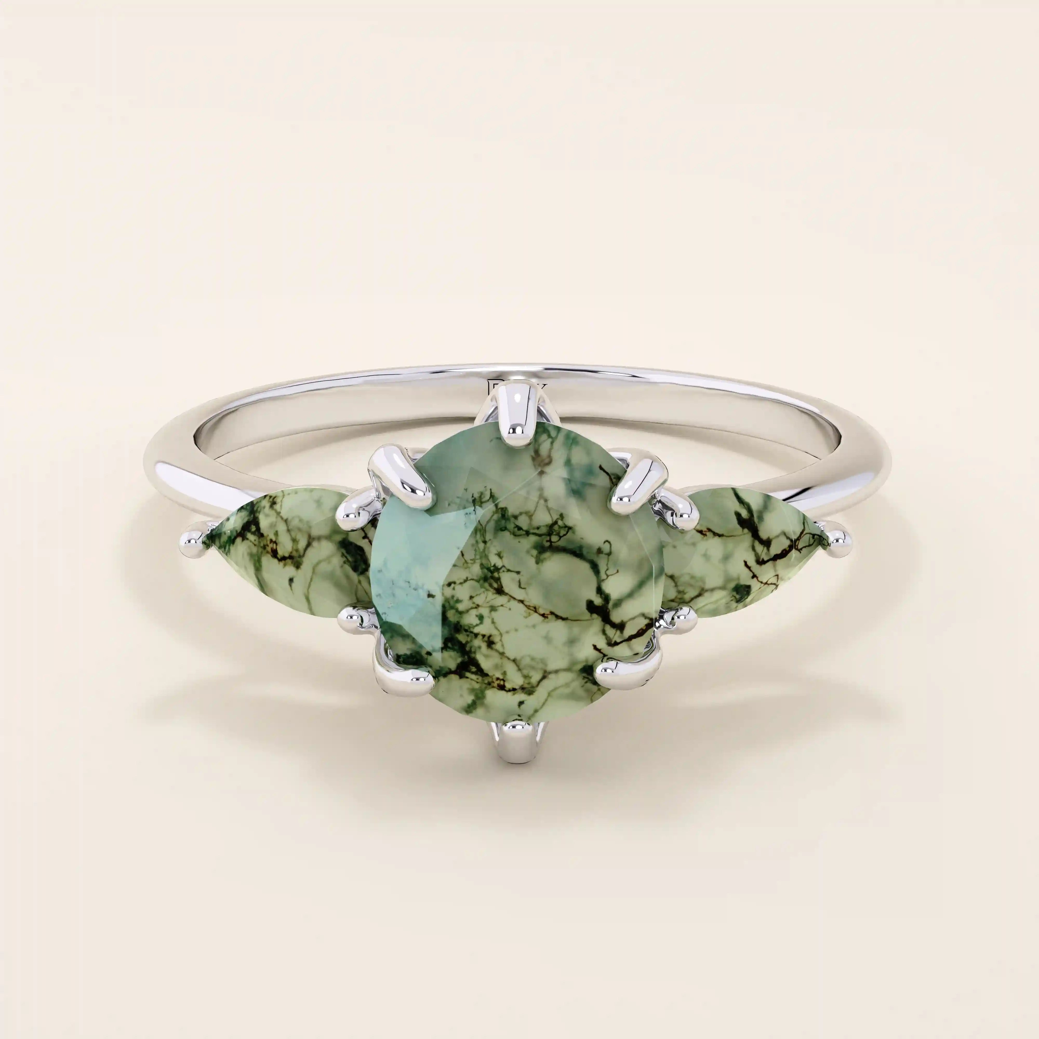 14k solid gold chunky ring with a natural moss agate gemstone. Unique and earthy anniversary jewelry design.