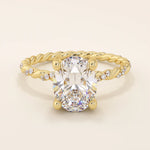 14k solid gold chunky solitaire engagement ring with an oval moissanite center stone. Modern and timeless design.