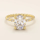 14k solid gold chunky solitaire engagement ring with an oval moissanite center stone. Modern and timeless design.